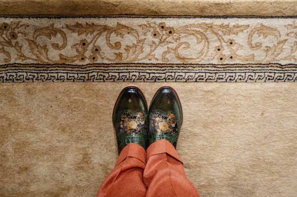 Shot of grooms brown and gold brogue shoes