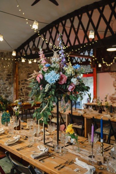 Flowers on the ballroom table with cutlery