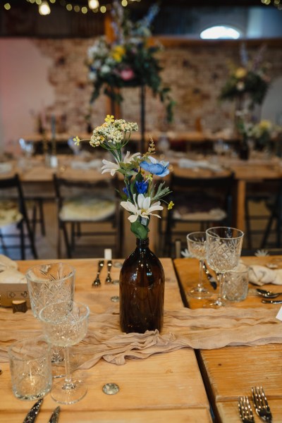 Blue flowers daisies on table in ballroom setting