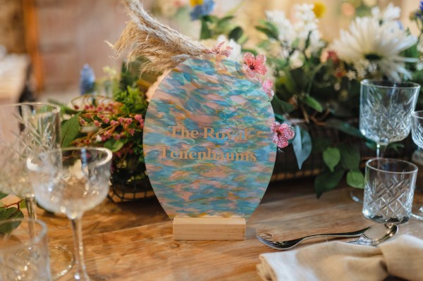 Glass ornament and cutlery on table