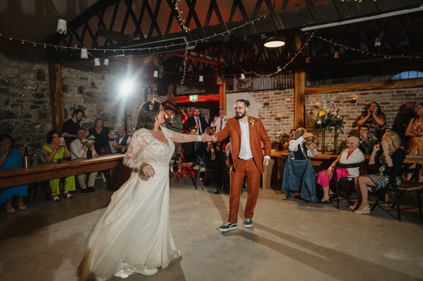 bride and groom dance on the dancefloor together