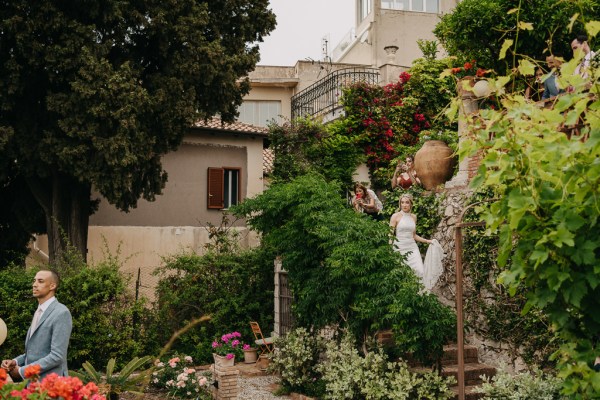 bride walks down the steps