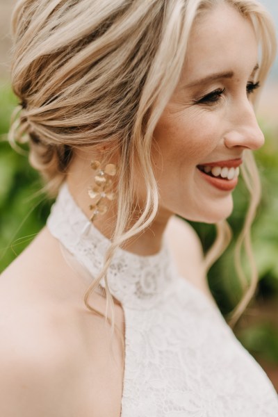 smiling bride in garden setting