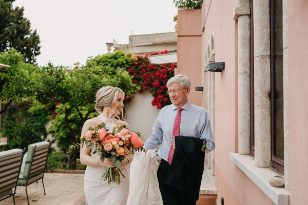 mother and father make their way to the ceremony