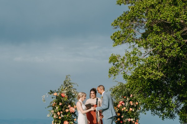 bride and groom at the alter with celebrant