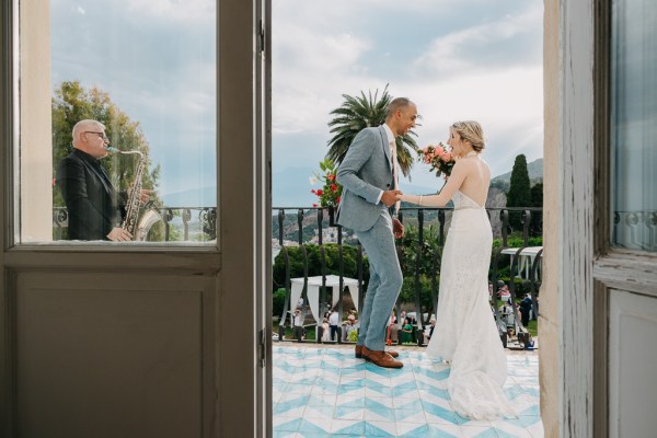 bride and groom dance outside