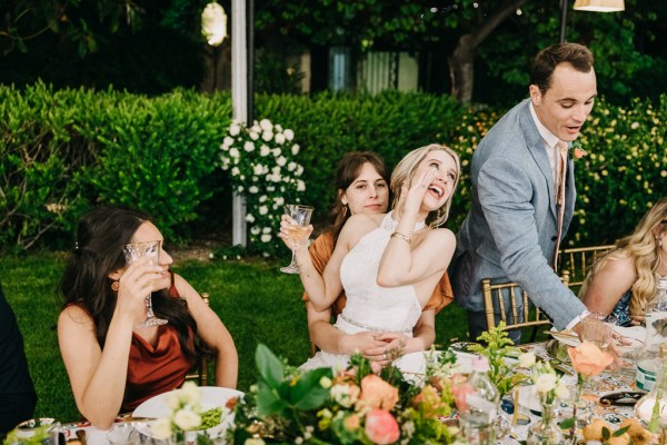 bride hollers at guest giving speech heckles