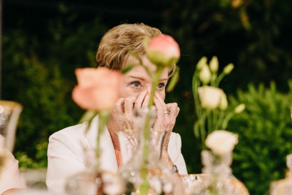 guest laughs at the dining room table