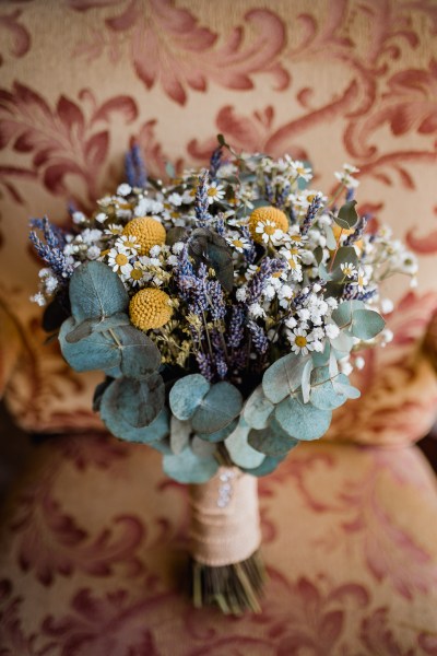 Bridal bouquet on sofa couch