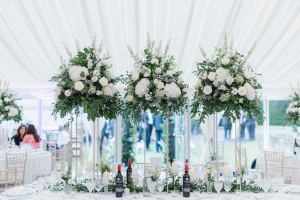 blue interior dining room decor under marquee setting