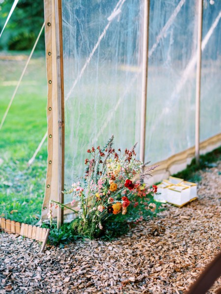 shot of flowers boquet on the ground to greenhouse