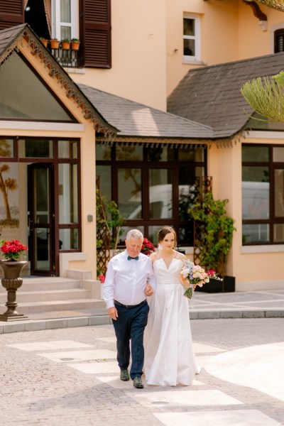 father of the bride outside wedding venue