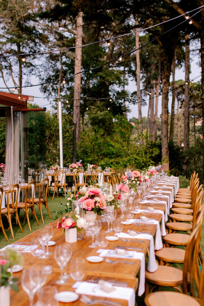 table and chairs exterior wooden dining room garden trees setting