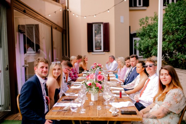 guests bride groom seated in dining room