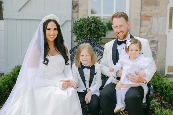 Family pic of bride groom son and daughter