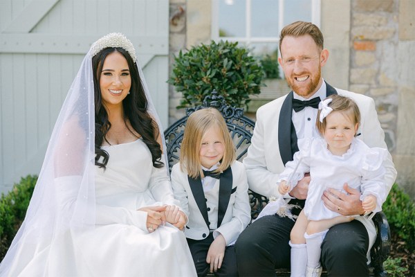 Family pic of bride groom son and daughter