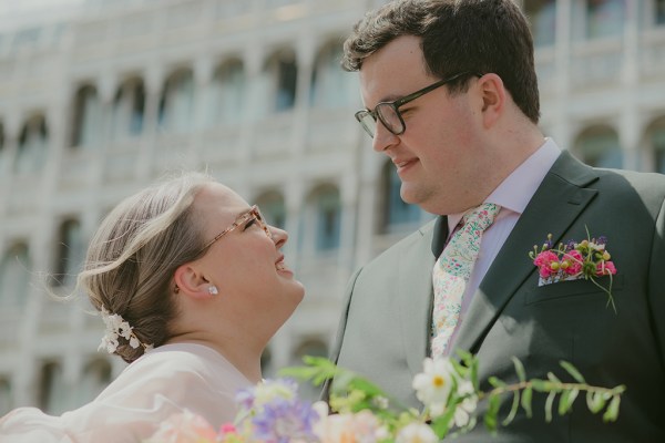 bride and groom look at each other