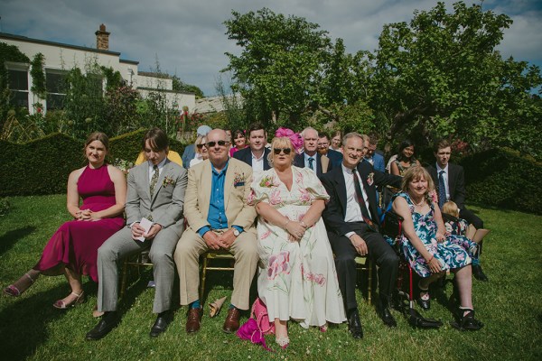 family members in audience seated during ceremony