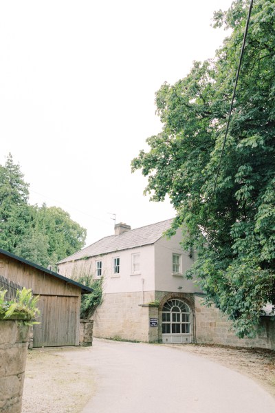 exterior wedding venue green grass setting and trees