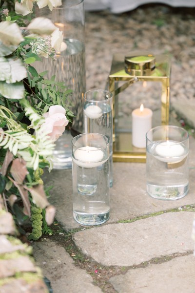 candles lit lanterns and flowers