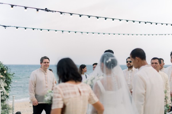 bride and bridesmaids from behind