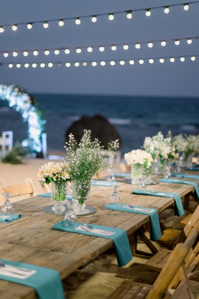 blue table setting wooden flowers decor