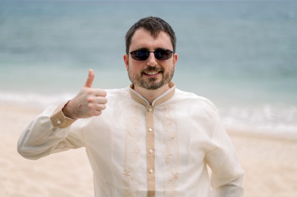 groomsman gives the thumbs up