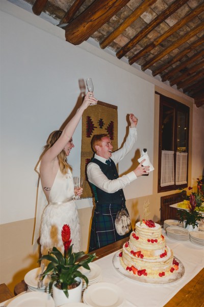 dining room table guests bride and groom celebrating