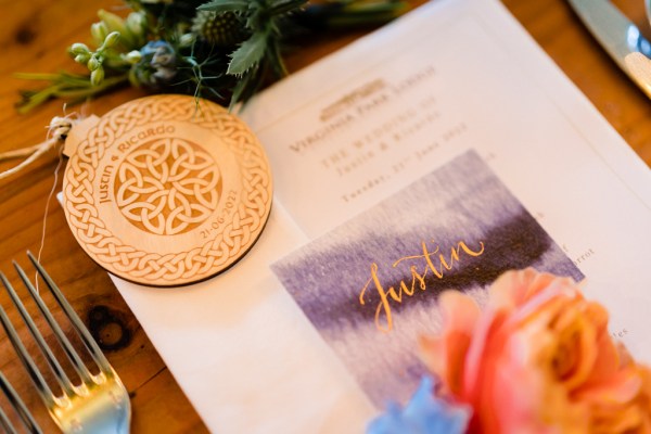 bauble decoration and wreath laid out on table