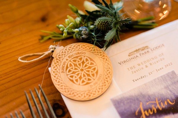 bauble decoration and wreath laid out on table