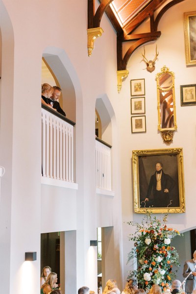 Top view of wedding portraits on wall ceremony setting