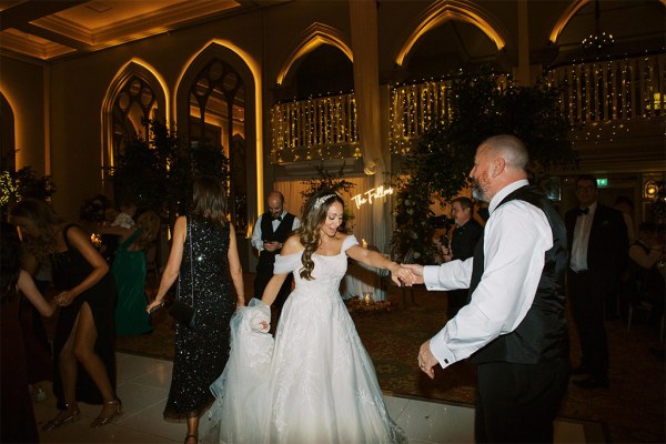 Bride and groom dance on the dancefloor together