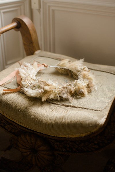 flower wreath on chair resting