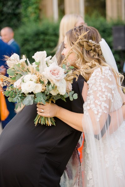 father and daughter bride hug embrace