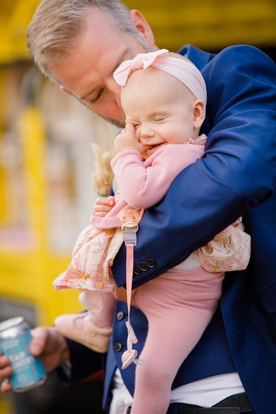 little baby girl wearing pink dress