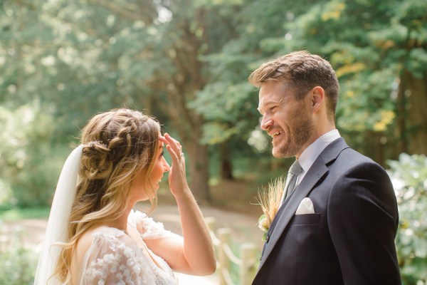 bride and groom smiling laughing together