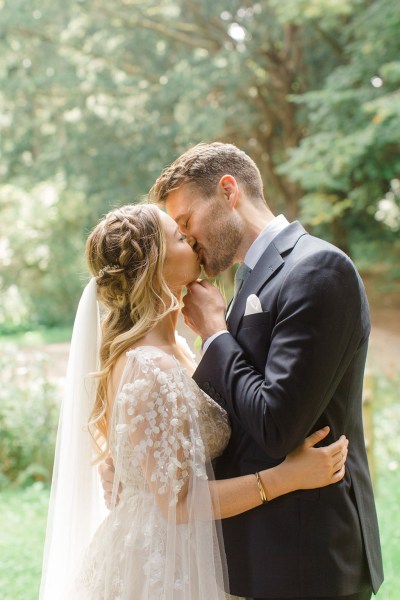 bride and groom kiss