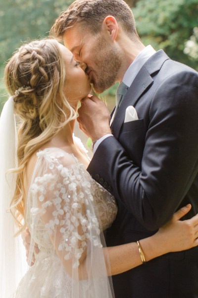 bride and groom kiss