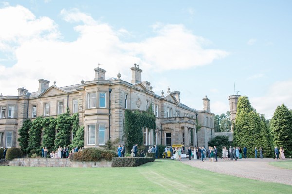 wide shot exterior setting wedding venue and grass