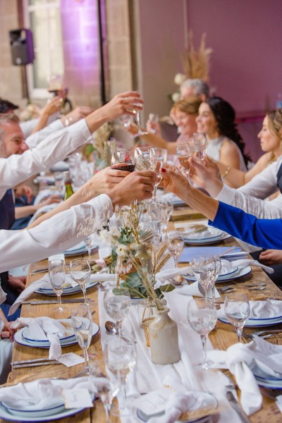 guests cheers at table