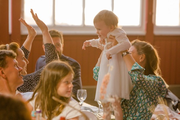 little girl at table with another little girl