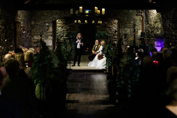 dark shot of aisle view during ceremony