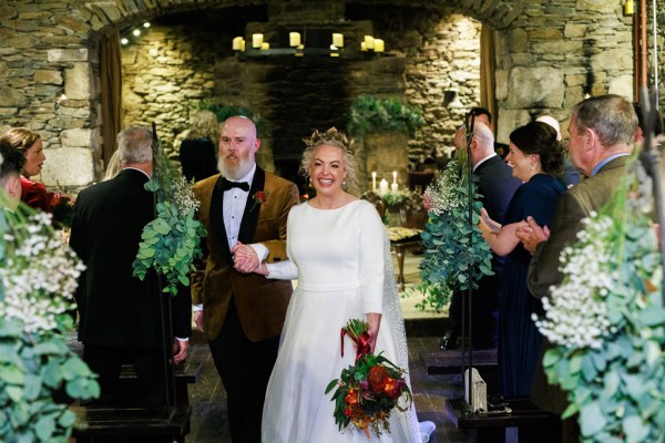 bride and groom begin to exit ceremony