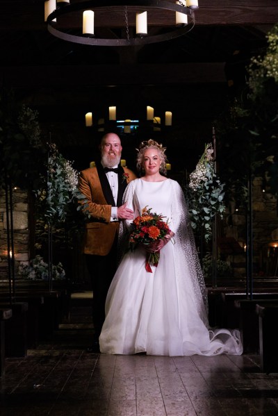 dark photo of bride and groom after ceremony