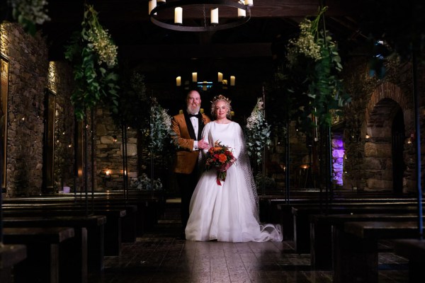 dark photo of bride and groom after ceremony