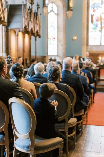 guests seated in audience in chairs during ceremony