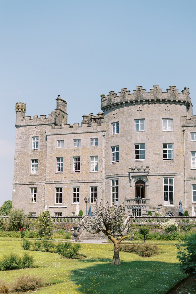 atmosphere shot of sunny wedding day castle