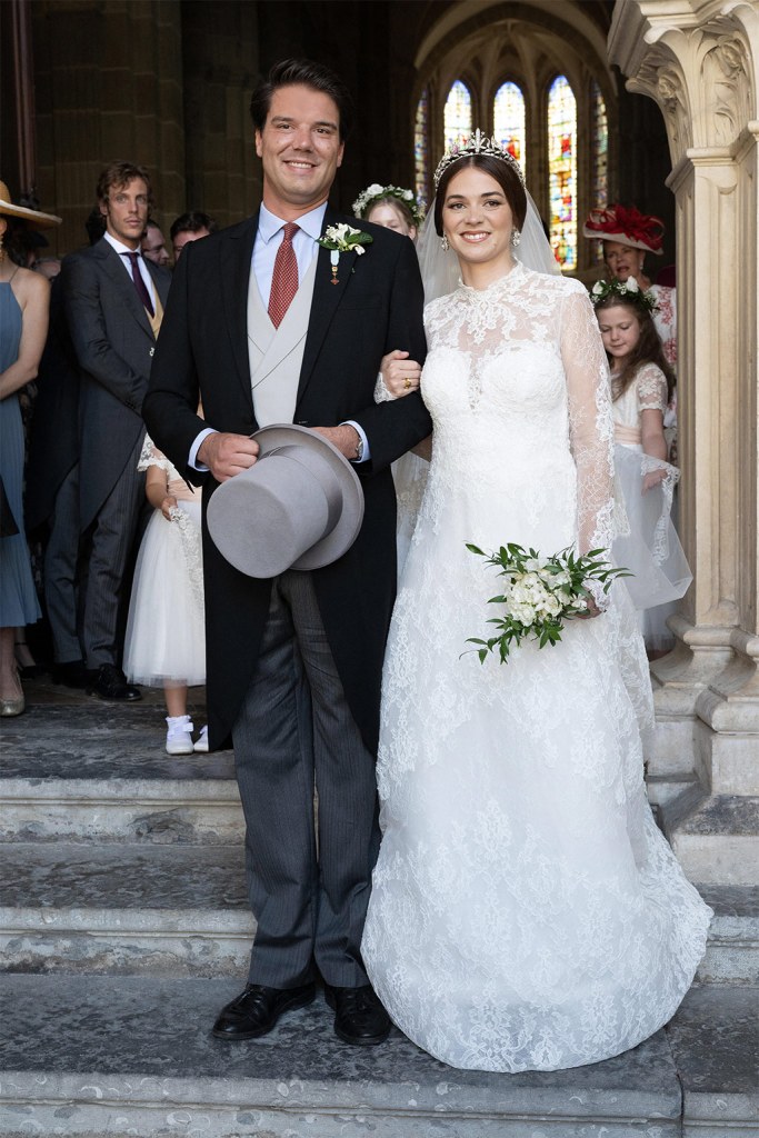 Prince Amaury Bourbon-Parme and Miss Pelagie Mac Mahon pose after their Royal wedding ceremony at Saint-Lazare cathedral