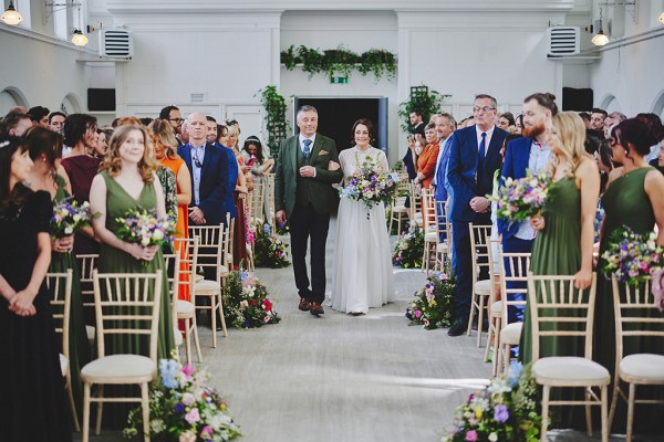 Father of the bride walks daughter down the aisle