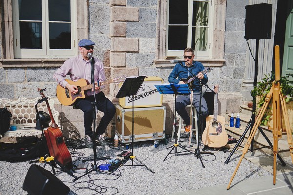 Wedding band musicians playing songs singing